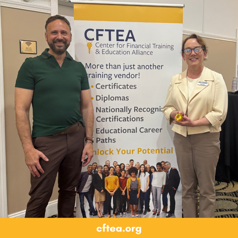 Two people stand smiling beside a CFTEA banner at an event. The man on the left is wearing a dark green short-sleeve shirt and brown pants, and the woman on the right is wearing a cream jacket and holding a small award. The banner behind them reads “CFTEA: Center for Financial Training & Education Alliance” and lists Certificates, Diplomas, Nationally Recognized Certifications, and Educational Career Paths with the tagline “Unlock Your Potential.” The bottom of the image features a gold banner with the website cftea.org. CFT Bank Training
